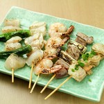 Assortment of five Grilled skewer