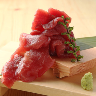 A fishing specialty! Tuna piled high enough to spill over
