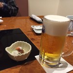 かに道楽 - 生ビール756円(税込)
            お通し324円(税込)