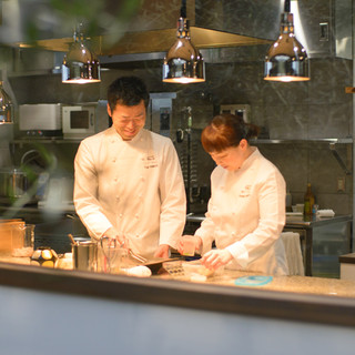 Yuji Yoneda and Asami - a married couple in the kitchen