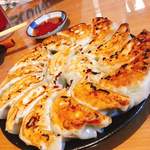 居酒屋 十勝 - 十勝の円盤餃子
                                旨い