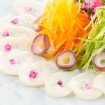 Sashimi of Hokkaido octopus with colorful vegetables and plum soy sauce