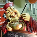 麺屋 菜心 - この店のマスコットキャラ？ ラーメン専門店ではなく中華料理店であることが分かる。