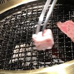 高麗房 - 網に脂を馴染ませ