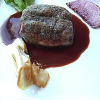 Dining & Bar TENQOO - 仔牛ロース肉のオリーブ風味焼き