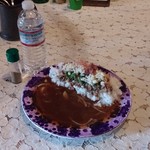 平日昼だけ - 和だしそぼろカレー（お冷はクリスタルガイザー）