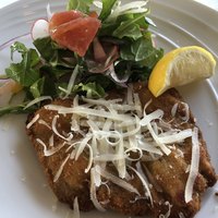 リストランテ・アルコ - 仔牛のカツレツミラノ風　ルッコラとトマトのサラダ添え