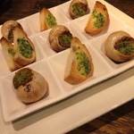 Grilled escargot with garlic butter