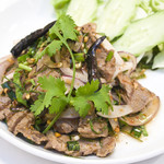 Grilled beef with spicy herbs "Nua Nam Tok"