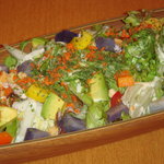 Caesar salad with red sweet potato and avocado