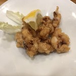 鮨処 祭 - お通し げその唐揚げ
            ※油切れが悪く油ぽかった・・・