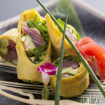 Seafood and avocado raw yuba spring rolls