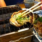 磯丸水産 - カニ味噌甲羅焼き！