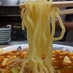 弥生亭 - サッポロ製麺の麵の表情