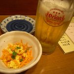 菜酒家FU-KU - お通しのニンジンチャンプルーとオリオン生ビール