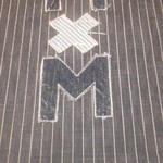 マジック×マレット - 裏面にも模様というかトレードマーク？。芸が細かくこの店らしいと思ったミャ