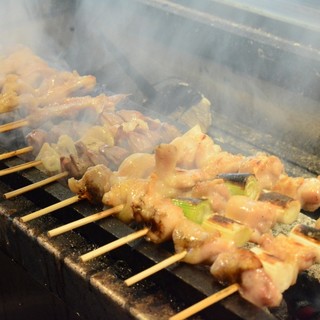 Skewered dishes grilled on authentic Bincho charcoal and the owner's special shochu