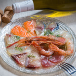 Herb-flavored carpaccio made from natural fresh fish