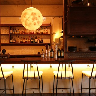 Counter seats directly under the “moon”