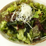 KOREAN salad with sunny lettuce and seaweed
