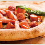 Gurateshimo - Pizza ポルチェリーノ　・ソーセージとブロックベーコンをふんだんに使ったボリューム満点のピッツァです。