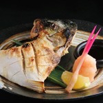 Grilled yellowtail fish with salt