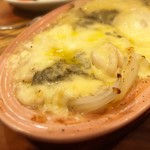 立飲・ビストロシン サンテ - 白子と新玉ねぎのチーズ焼き。
      熱々の白子の食感がウマシ！