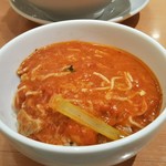 太陽のトマト麺  - 残ったスープをバジリゾにかける