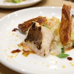 Grilled red sea bream with red onion and apple vinaigrette