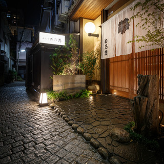 A storefront located in a back alley