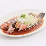 Cantonese-style steamed live fish