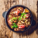 Oven-baked potatoes with Shintoku raclette cheese and crab