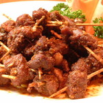 Spicy stir-fried lamb skewers