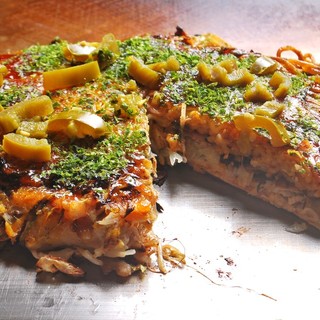 Moist fresh cabbage and spicy jalapeños...Enjoy delicious vegetables with our popular Okonomiyaki.