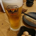 魚久商店 - 生ビール・お通し。
