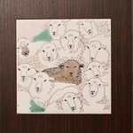 ラ・サンテ - 壁に埋め込まれた羊のタイル