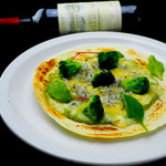 Genoa pizza with whitebait and broccoli