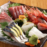 Assorted sashimi (5 items): medium fatty tuna, salmon, raw squid, mackerel, sweet shrimp