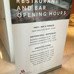 MIDTOWN GRILL -RESTAURANT - ホテル入ってみぎての看板