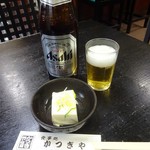 かつぎや - 瓶ビールとサービスのお通し