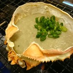 磯丸水産 - 真っ先に注文した蟹味噌甲羅焼