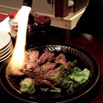 立ち拠り酒場 榮 - 2018.3.24  牛シャシュリーク☆  串焼きを回しながら切ったあと、バナーで炙ります