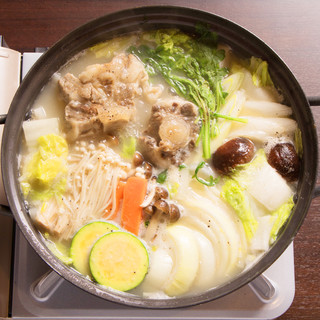 High praise! The exquisite ``tail hotpot'' is a must-try menu item only available here.