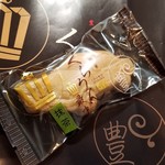 つたや - 「幸せのピンクくらうん最中 (200円)」のパッケージ
