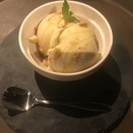 Ice cream with roasted nuts and olive oil sauce