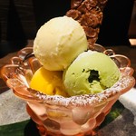 Assortment of 3 types of Ice cream (coconut, pistachio, mango)