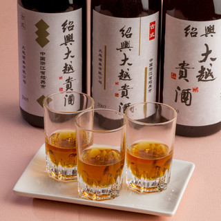 Traditional Chinese Shaoxing wine that complements dishes.