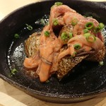 魚と飯や龍 - じゃがバター。なんと塩辛が乗っている。