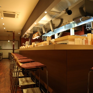 The restaurant is filled with a live atmosphere where you can see the chefs in action.