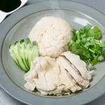 Steamed rice topped with boiled chicken Khao Man Gai